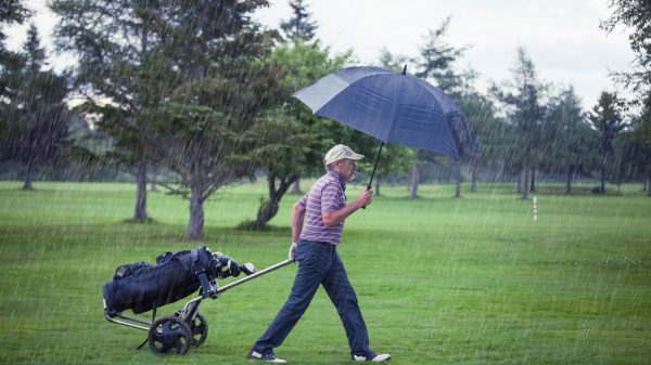 Golfer on a rainy day 1