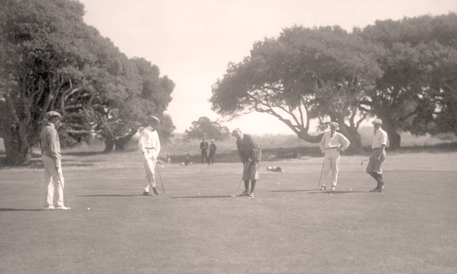 During an August 1910 practice round for the Del Monte Cup Championship, a cameraman caught these young golfers playing in a five-some. From left to right, Charles Templeton (grandson of railroad baron Charles Crocker); Jack Neville (who would later co-design Pebble Beach Golf Links and win a record five California Amateurs); Albert S. Lilly (of Standard Oil); Vincent Whitney (who, a couple weeks later, won the 1910 Pacific Coast Championship at Del Monte); and Austin H. White (who defeated Whitney in the semifinal match of the 1910 Del Monte Cup, but finished runner-up in the finals).