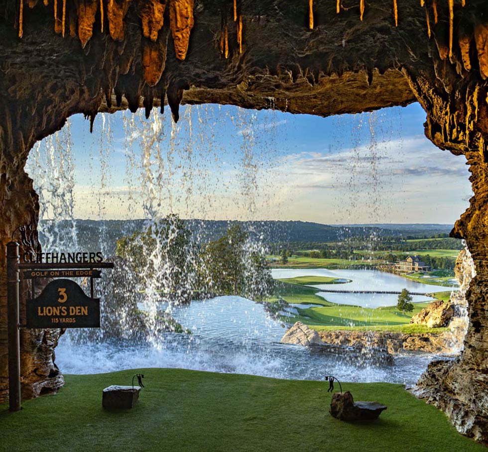 Cliffhangers Lion’s Den, a dramatic par-3 tee shot from a limestone cave through a waterfall to a green below in Branson, Missouri