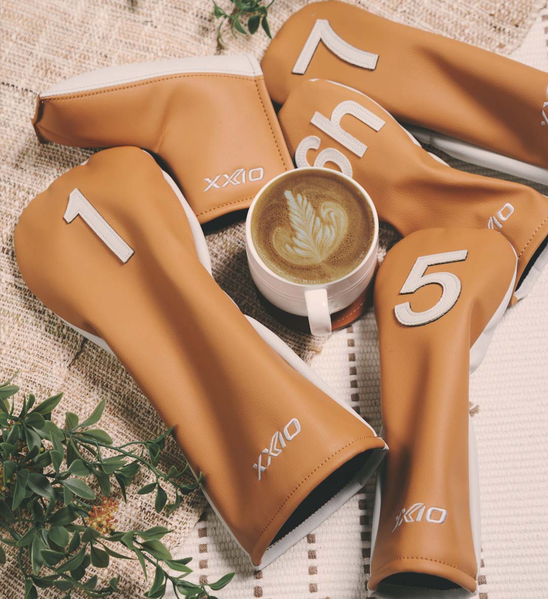 The 2026 XXIO x VESSEL Latte Collection pairs clubs with a matching stand bag.