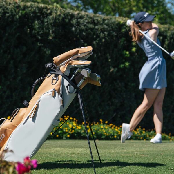 The 2026 XXIO x VESSEL Latte Collection pairs clubs with a matching stand bag.